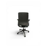 Steelcase Amia office chair featuring adjustable arms and a gray fabric seat