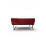 Esto soft seating bench features a unique two-tone design with a patterned yellow back and an orange seat Retails for $1200