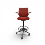 Steelcase Cobi drafting stool featuring a red mesh back and seat with an adjustable foot ring