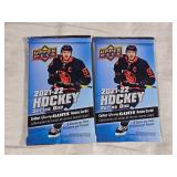Lot of 2 Unopened 2021-22 Upper Deck Hockey Series One with Young Guns Rookie Cards.