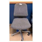 armless gray chair