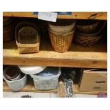 two shelves of baskets and decorative rocks