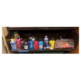 shelf of acrylic paints