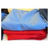 Red round tablecloth and blue table cloth