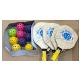 pickleball paddles and balls