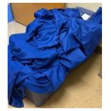 Blue cap and gowns two totes and a crate