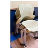 five green chairs