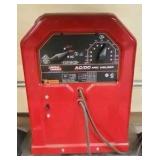 AC/DC arc welder with stand