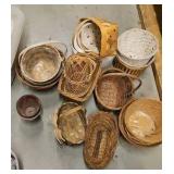 two shelves of baskets and decorative rocks