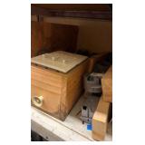 shelf of multimeter light switches nails in tote of leather materials
