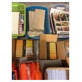 brand new boxes of chalk oil, pastels, watercolors, sending bricks, crayons, large glue sticks, paint brushes, Clay, and cutting tools