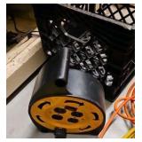 crate of extension cords and extension Outlets