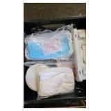 crate of first aid hand sanitizer masks