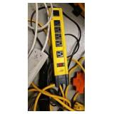 crate of extension cords and extension Outlets