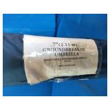 Tommy Bahama Groundbreaker 7ft beach umbrella with a blue fabric.