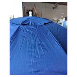 Tommy Bahama Groundbreaker 7ft beach umbrella with a blue fabric.