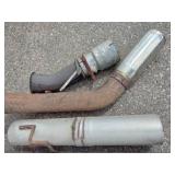 Exhaust manifold with a turbocharger attached, along with various 4" straight and bent pipes, a muffler or resonator, and a tailpipe tip.