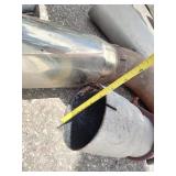 Exhaust manifold with a turbocharger attached, along with various 4" straight and bent pipes, a muffler or resonator, and a tailpipe tip.