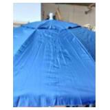 Tommy Bahama Groundbreaker 7ft beach umbrella with a blue fabric.