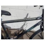 Specialized Hardrock mountain bike, commonly featuring a steel frame and 26-inch wheels.
