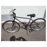 Specialized Hardrock mountain bike, commonly featuring a steel frame and 26-inch wheels.