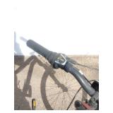 Maroon Specialized Hotrock 24 mountain bike with 24-inch wheels.