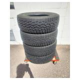 Set of four all-terrain or winter tires  235/65R17.