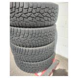 Set of four all-terrain or winter tires  235/65R17.