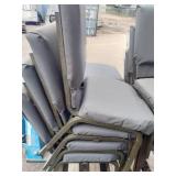 (11) Stackable metal-frame chairs featuring gray, cushioned seats and backs