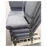 (11) Stackable metal-frame chairs featuring gray, cushioned seats and backs