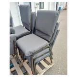 (11) Stackable metal-frame chairs featuring gray, cushioned seats and backs