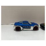 2 Red Line Hot Wheels Cars: 2017 Fast Fish Green and 2018 Symbolie HW City Police
