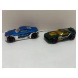 2 Red Line Hot Wheels Cars: 2017 Fast Fish Green and 2018 Symbolie HW City Police
