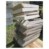 Half pallet base with stacks of woo...