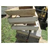 Half pallet base with stacks of woo...