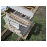 Half pallet base with stacks of woo...