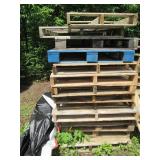 14 full size wood pallets...
