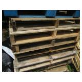 14 full size wood pallets...