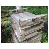 Stack of 9 wood half size pallets...