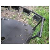 Tubular metal railing, coated green...