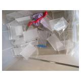 Clamshell closing tote containing a...