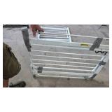 Two White Metal Safety Gates