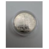 90% Silver 1986 Ellis Island Commemorative Dollar Coin in Capsule