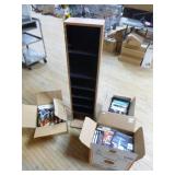 Tower Cabinet with DVDs and VHS Tapes