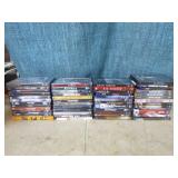 Tower Cabinet with DVDs and VHS Tapes