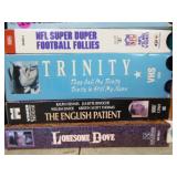 Tower Cabinet with DVDs and VHS Tapes