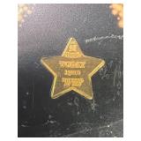 1 GRAM .999 FINE GOLD STAR SHAPED BAR