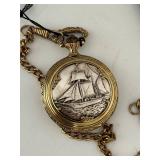Majestion Gold Tone Pocket Watch With Chain & Stand