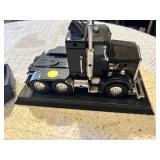 Jada Toys and Other Diecast Truck Models Including 1999 Silverado, 1969 Ford and Kenworth Truck