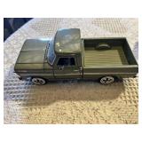 Jada Toys and Other Diecast Truck Models Including 1999 Silverado, 1969 Ford and Kenworth Truck